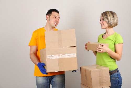 Professional moving team efficiently planning an office relocation in Merton